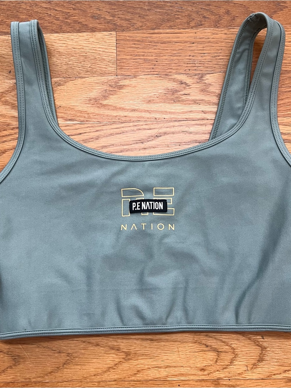 P.E Nation Grand Stand Sports Bra in Iceberg Green